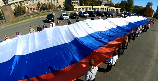 Общественные организации провели патриотическую акцию ко Дню воссоединения новых регионов с Россией